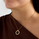 Necklace with inlaid circle