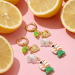 Earrings with chain and hanging charms