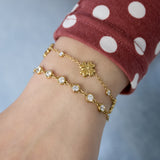 Link bracelet with round cubic zirconia stones