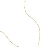 necklace with balls and heart charm