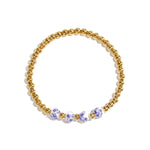 Solid beaded bracelet with beads in a blue floral print