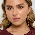 Hoop earrings with hanging chains and heart