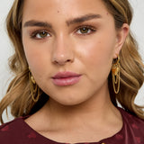 Hoop earrings with hanging chains and heart