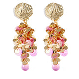 Shell earrings with hanging sequins
