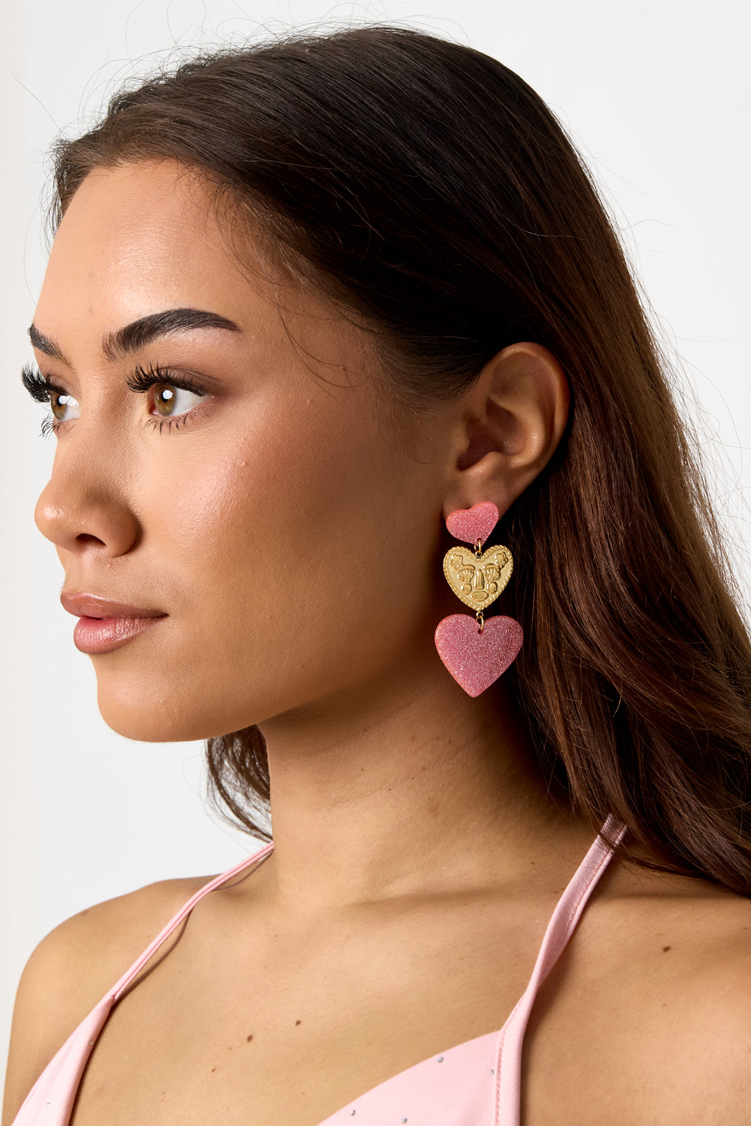 Statement earrings with glitter hearts