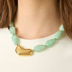 Necklace with asymmetric statement bead