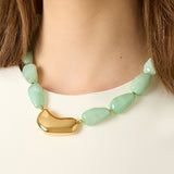 Necklace with asymmetric statement bead