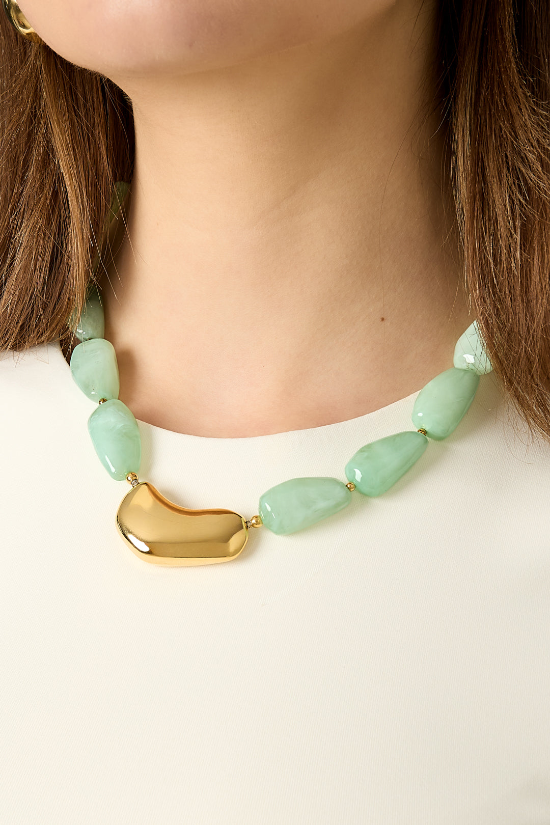 Necklace with asymmetric statement bead