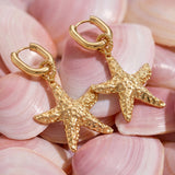 Squoval earrings with starfish pendant