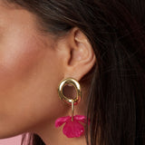Round earrings with hanging flower