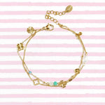 Bracelet with clover, beads and stones