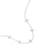 Necklace with clover motif and inlaid clovers