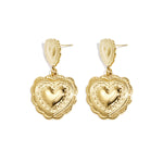 Earrings with heart-shaped pendants