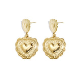 Earrings with heart-shaped pendants