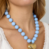 Bead necklace with hanging heart