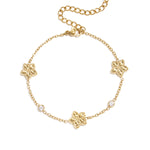Bracelet with an alternating pattern of flowers and stones
