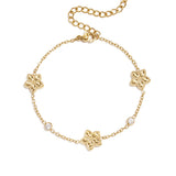 Bracelet with an alternating pattern of flowers and stones
