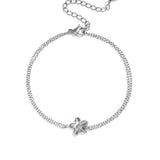 Bracelet with double chain and small flower