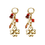 Small hoop earrings with hanging clover, beads and leaves