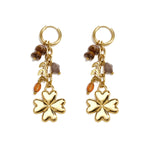 Small hoop earrings with hanging clover, beads and leaves