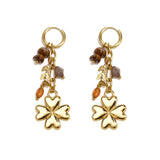 Small hoop earrings with hanging clover, beads and leaves