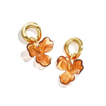 Round earrings with hanging flower
