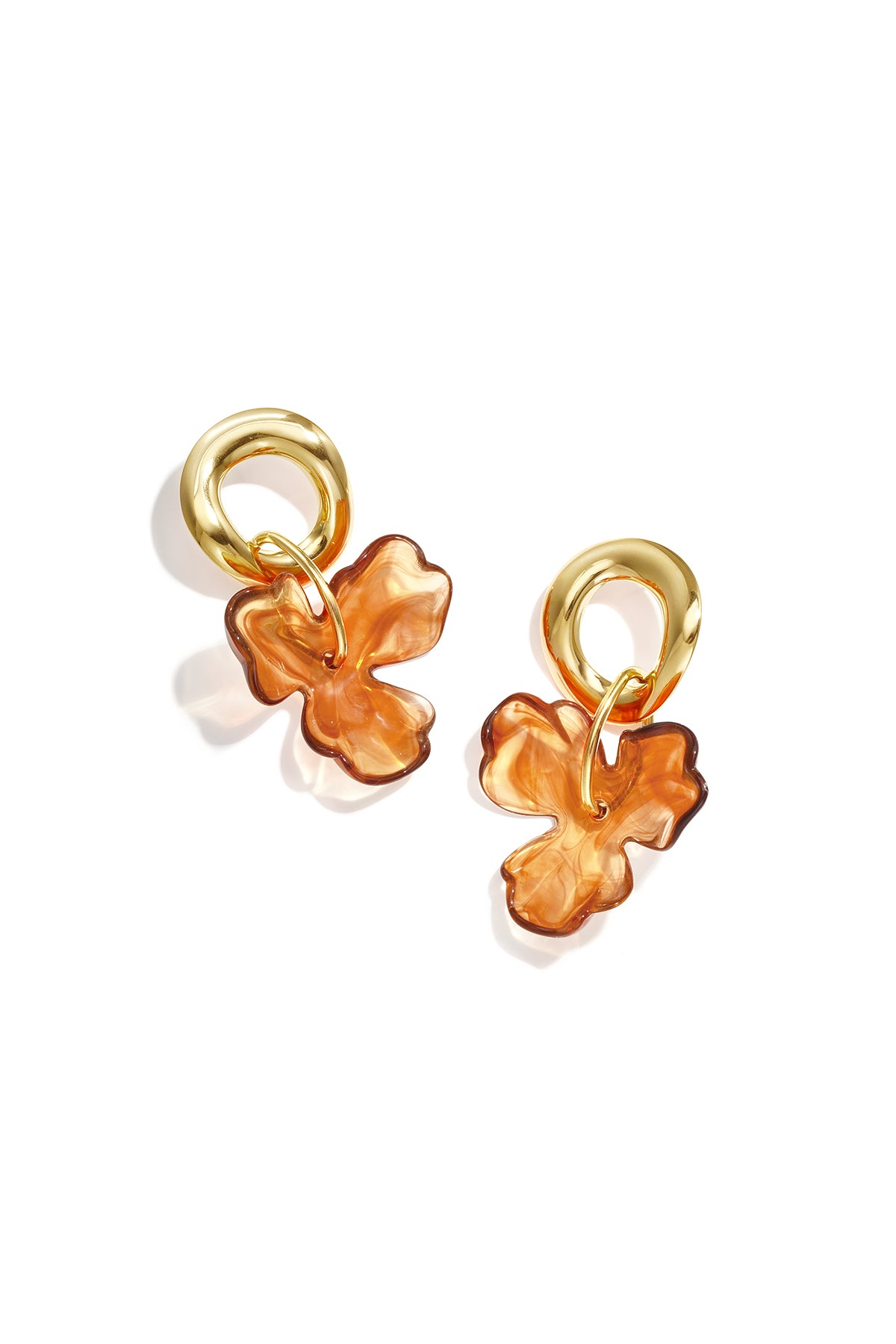 Round earrings with hanging flower
