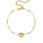 Bracelet with pearl, stone and statement heart