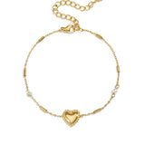 Bracelet with pearl, stone and statement heart