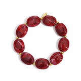 Beaded bracelet with oval and gold beads