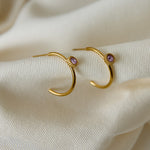 Hoop earrings with round stone