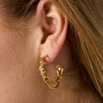 Double hoop earrings with twist