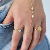Adjustable ring with heart-shaped stone and small heart