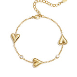 Bracelet with three solid hearts and stones
