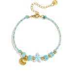Bracelet with rope-pattern beads, starfish, and shell