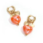 Earrings with heart pendants