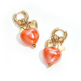 Earrings with heart pendants