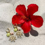 Oval hoop earrings with sun and bead charms