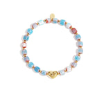 Beaded bracelet with heart-shaped centerpiece
