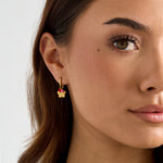 Earrings with hanging flower and beads