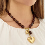 Squoval beaded necklace hanging heart