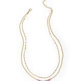 Layered necklaces with beads and hearts