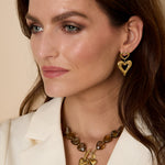 Bead necklace with hanging heart charms
