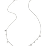 Necklace with alternating balls