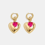Hoop earrings with heart pendant and bead on ring