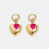 Hoop earrings with heart pendant and bead on ring