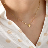 Necklace with pearl, stone and statement heart