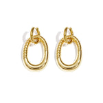 Statement earrings with detailed oval pendant