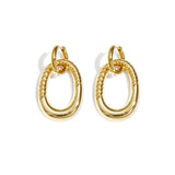 Statement earrings with detailed oval pendant