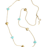 Long necklace with varying beads and shapes